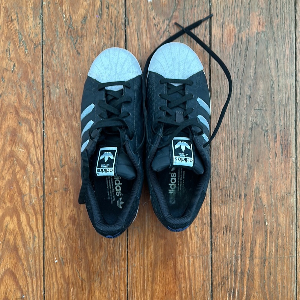 Adidas sneakers, black with white clam toe in excellent condition.